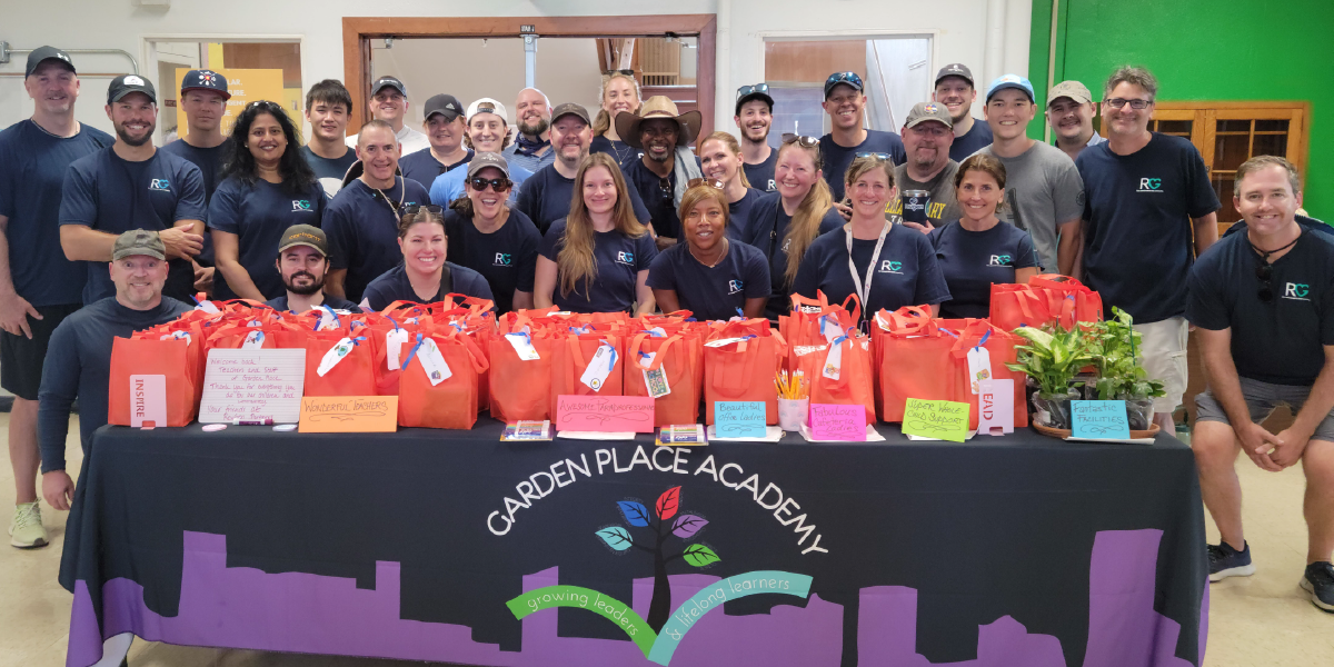 Embracing our values of stewardship and enjoyment, more than 30 RevGeners spent a recent afternoon helping our new community partner, Garden Place Academy, prepare for the start of the school year.